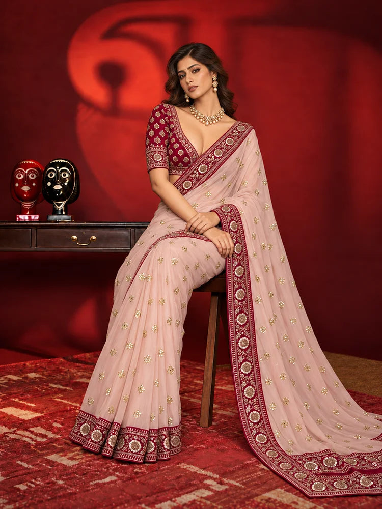 Soft Pink Saree with Delicate Golden Motifs and Embroidered Maroon Border-74268090433617