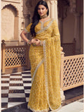 Bollywood Inspired Mustard Yellow Embroidered Net Saree with Intricate Border