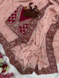 Soft Pink Saree with Delicate Golden Motifs and Embroidered Maroon Border