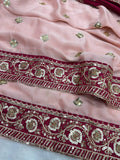 Soft Pink Saree with Delicate Golden Motifs and Embroidered Maroon Border