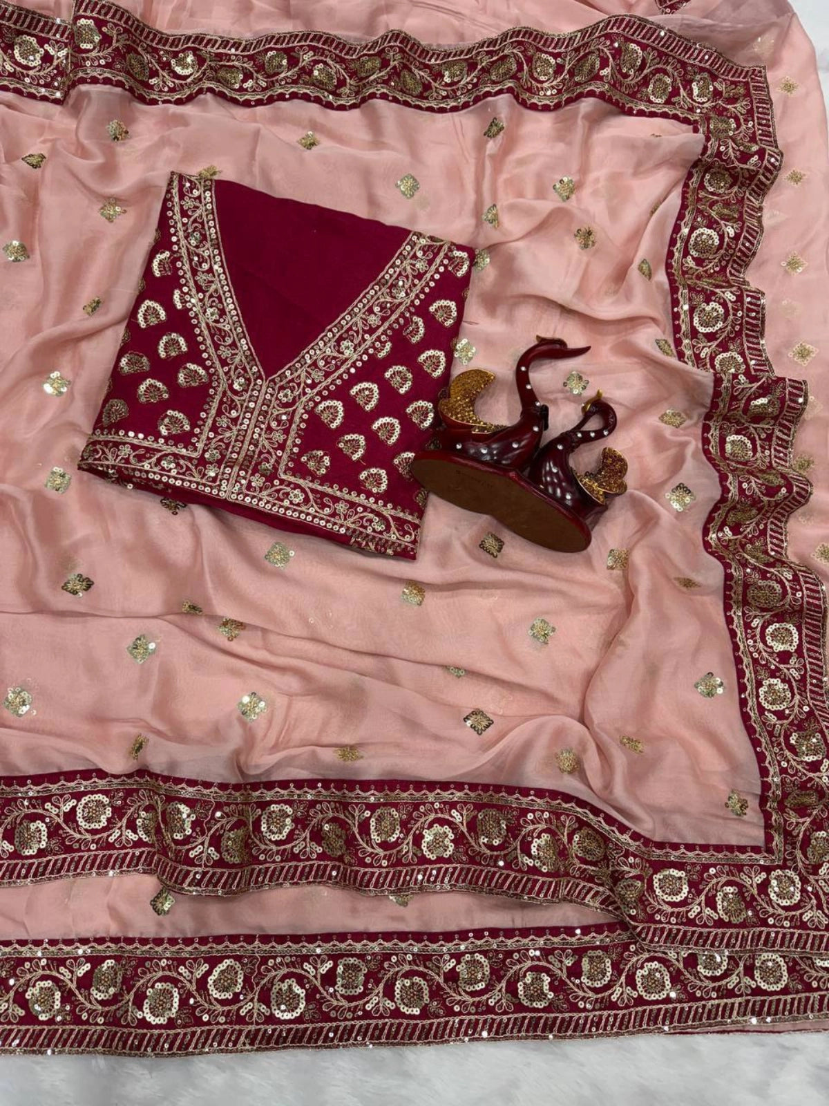 Soft Pink Saree with Delicate Golden Motifs and Embroidered Maroon Border-67269294129233