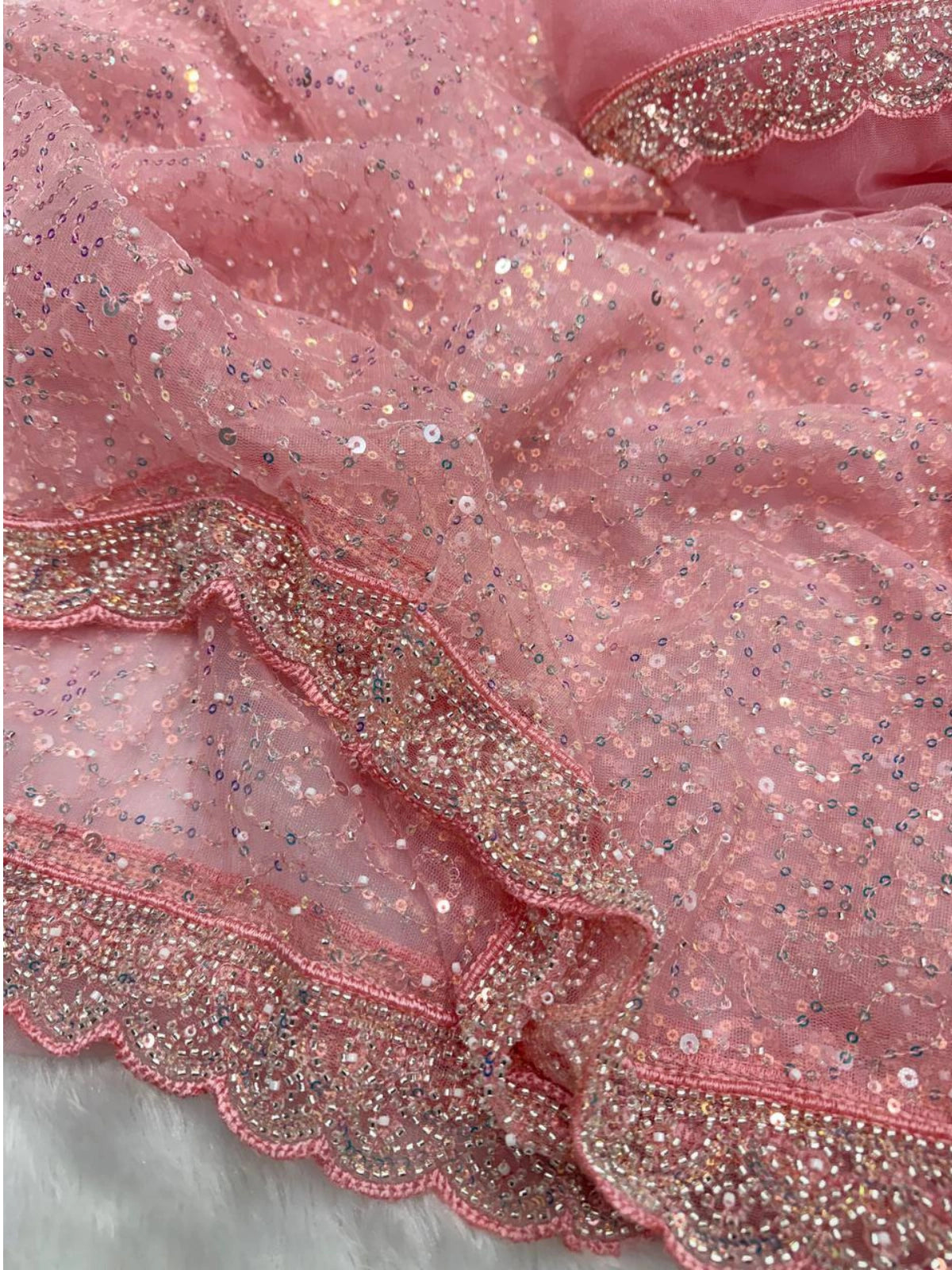 Bollywood Inspired Pink Soft Net Saree with Sequins and Beads Work