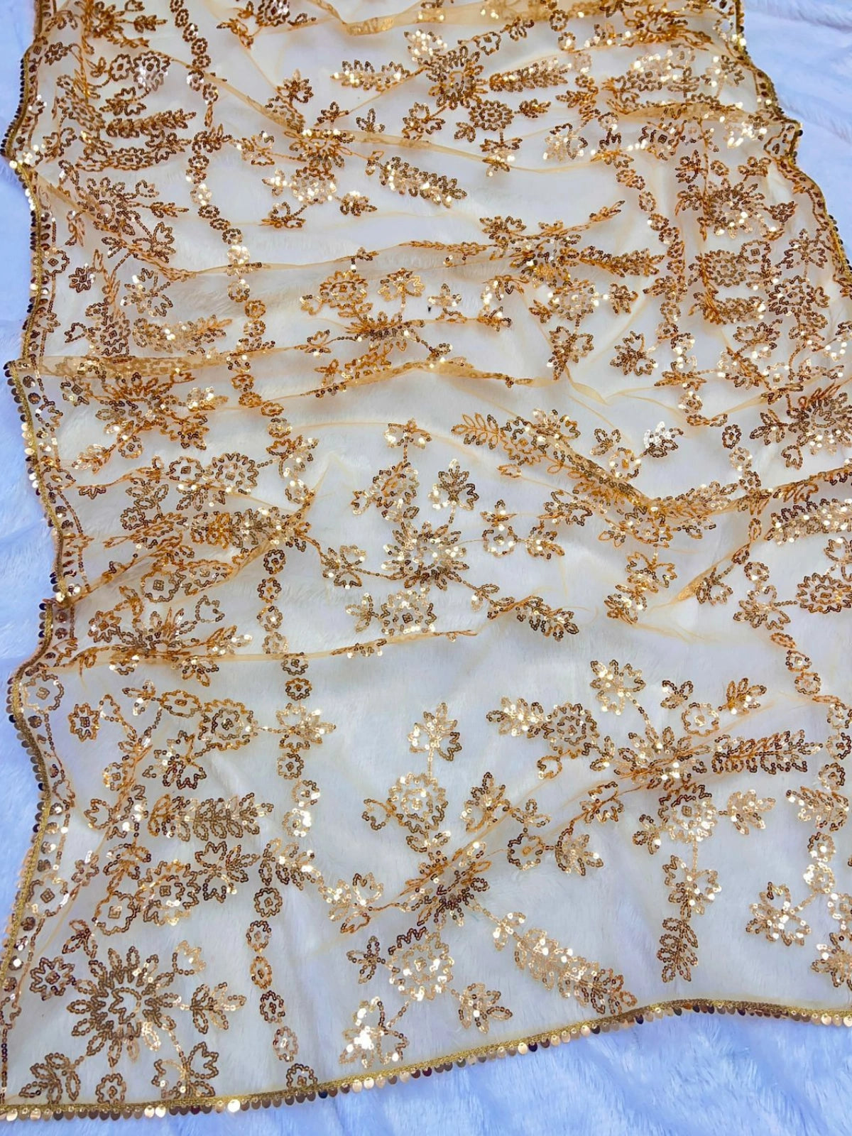 Bollywood Inspired Embroidered Golden Net Saree With Jhalar Border