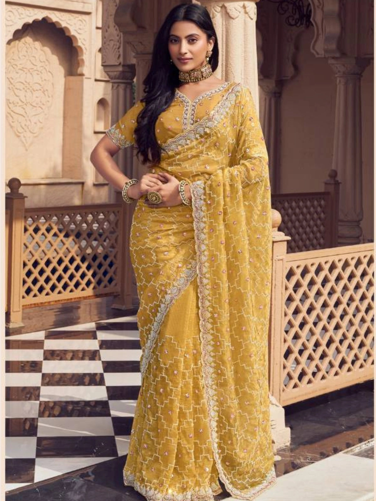 Bollywood Inspired Mustard Yellow Embroidered Net Saree with Intricate Border-67249497702481