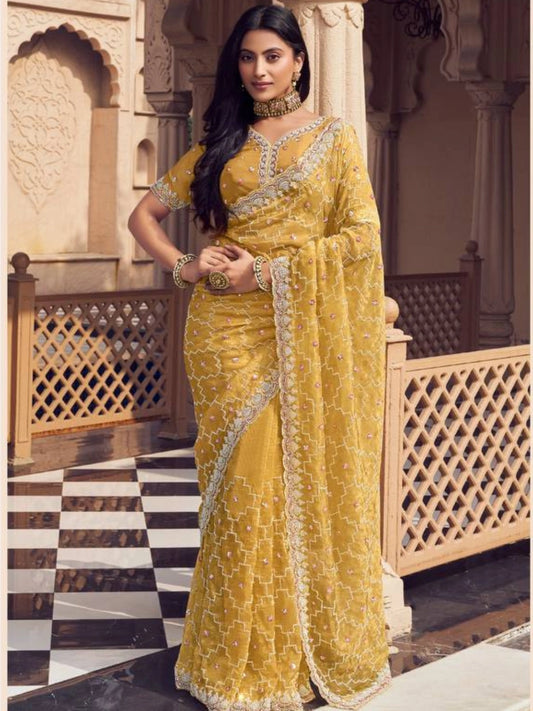 Bollywood Inspired Mustard Yellow Embroidered Net Saree with Intricate Border