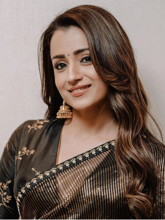 Trisha Inspired Black Saree with Gold Stripes and Rich Zari Design
