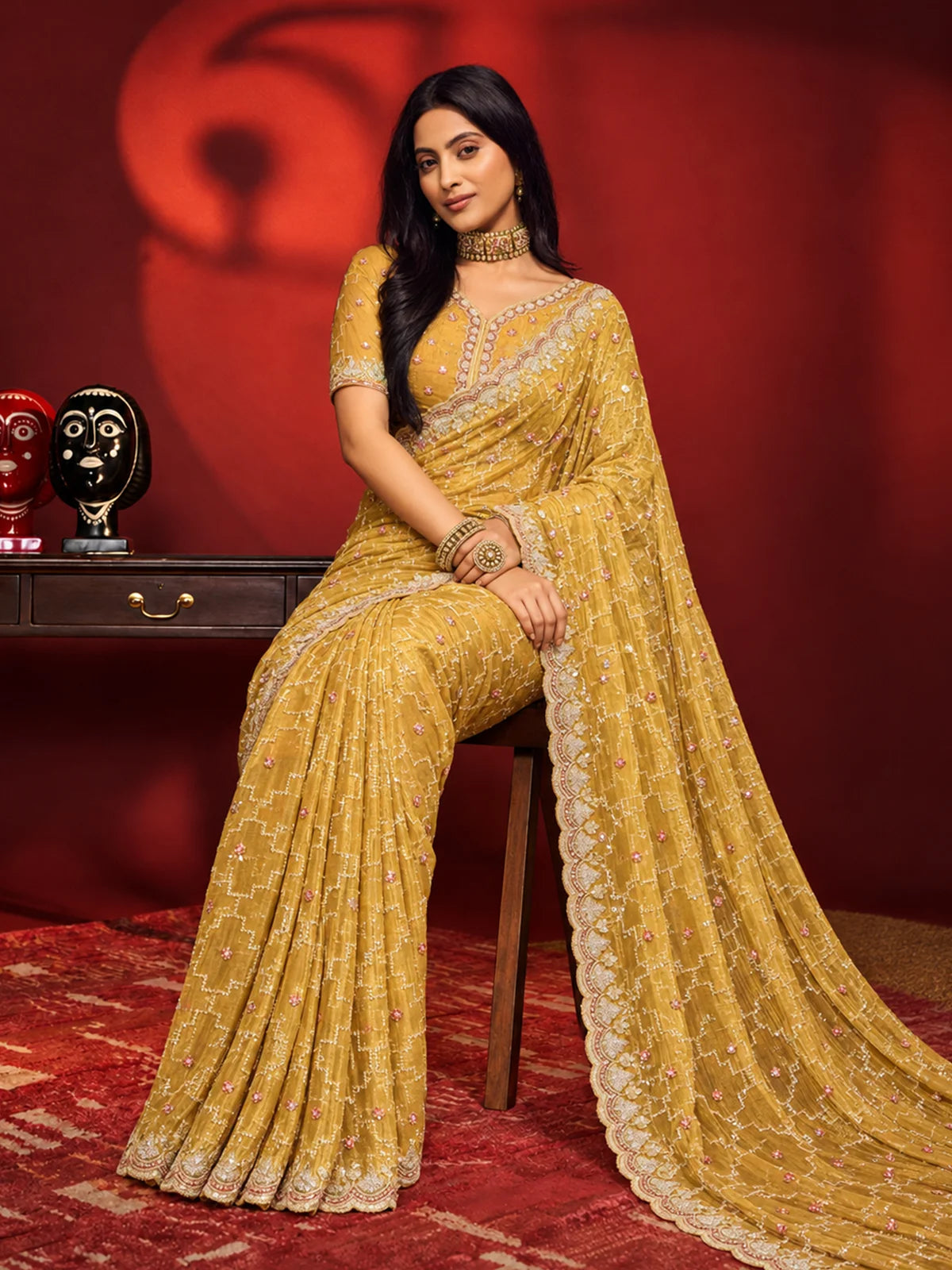 Bollywood Inspired Mustard Yellow Embroidered Net Saree with Intricate Border