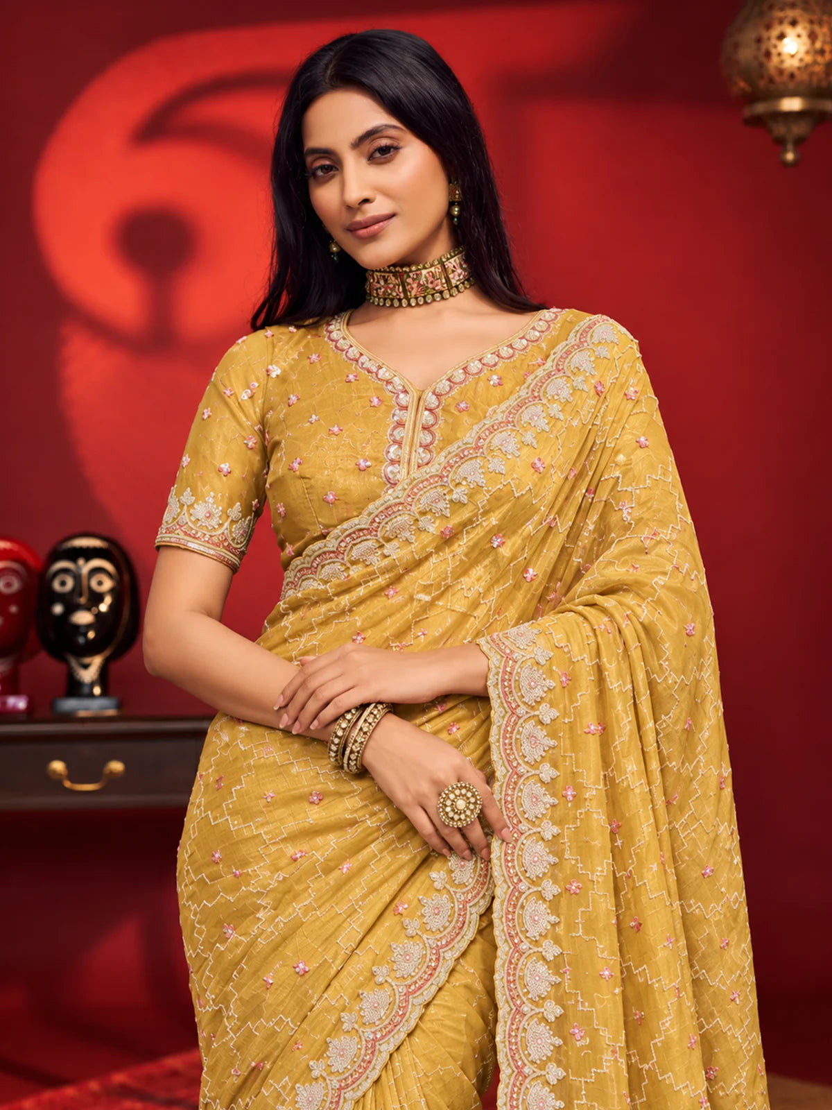 Bollywood Inspired Mustard Yellow Embroidered Net Saree with Intricate Border