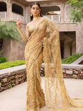 Bollywood Inspired Embroidered Golden Net Saree With Coin Lace