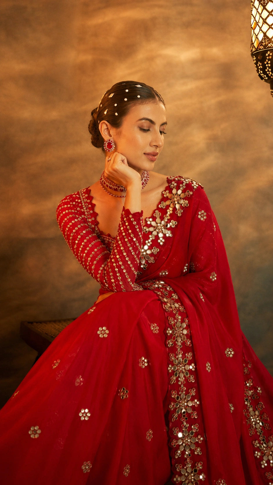 Bollywood Inspired Red Mirror Work Saree with Intricate Floral Detailing