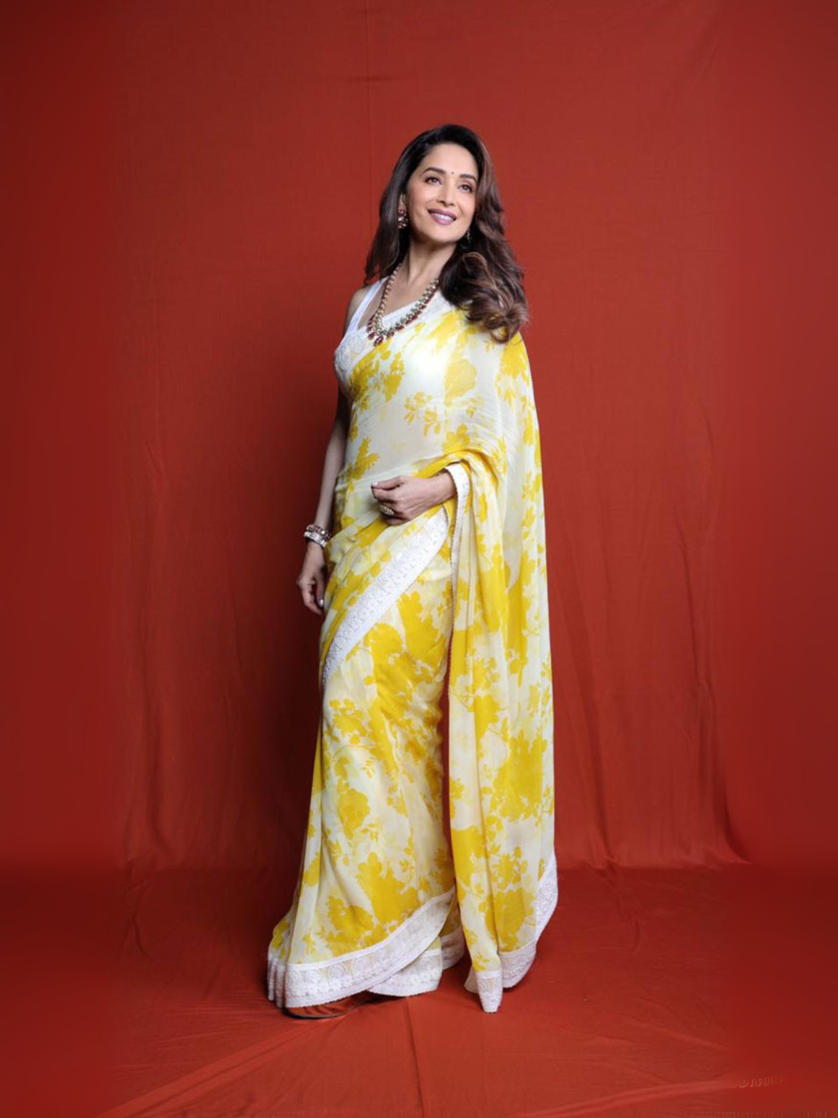 Madhuri Inspired Floral Printed Georgette Yellow Saree