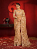 Bollywood Inspired Embroidered Golden Net Saree With Jhalar Border