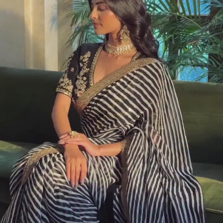 Bollywood Inspired Soft Georgette Leriya Print Black Saree with Sequins Embroidery