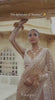 Bollywood Inspired Golden Honeycomb Pattern Net Saree with Tassel Border